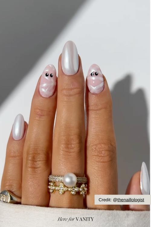 cute halloween nails with ghosts